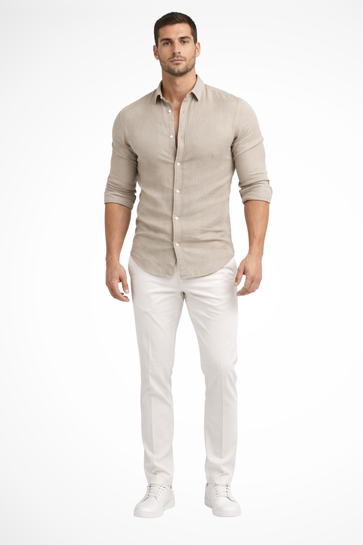 Man models a loose fit long sleeve casual summer shirt, perfect for warm weather men's fashion.