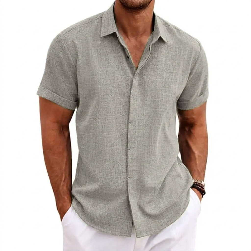 Breathable men's loose fit short sleeve shirt, comfortable for hot summer days, travel, and beach vacations.