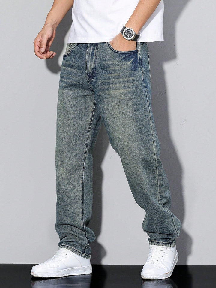 Comfortable men's loose fit denim pants with a washed finish and straight leg design. Casual wear.