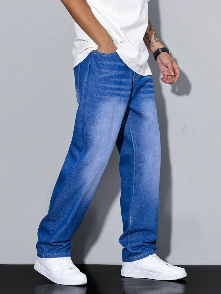 Folded men's loose fit straight leg washed denim pants. Ready for casual, everyday outfits.