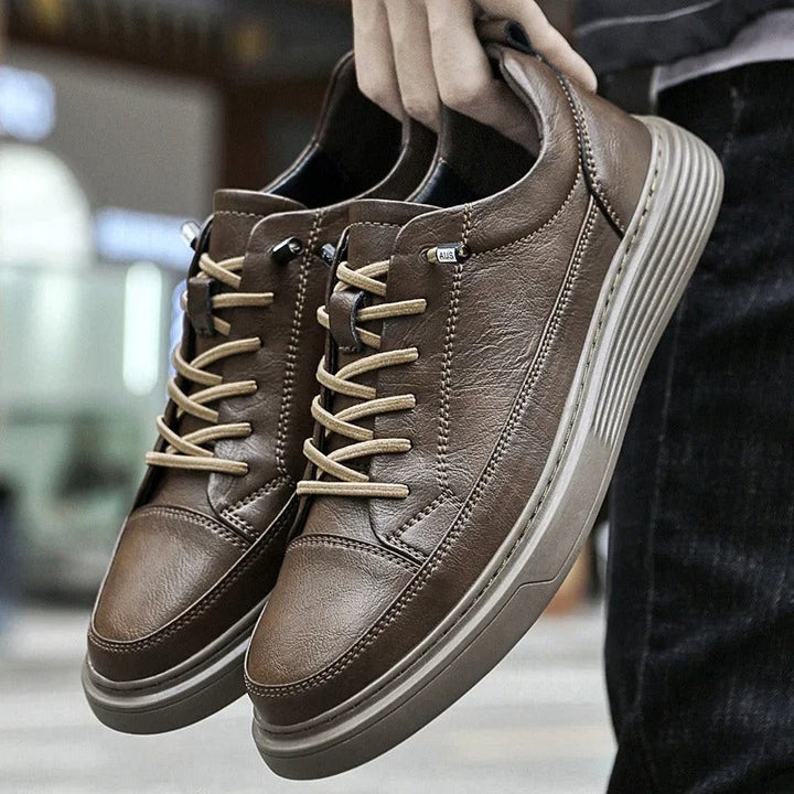 Stylish men's low top sneakers, modern lace-up design, comfortable for walking.