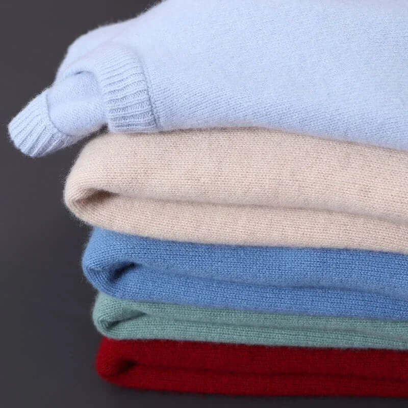 Elegant off-white men's soft knit sweater, a classic long sleeve pullover for comfort.