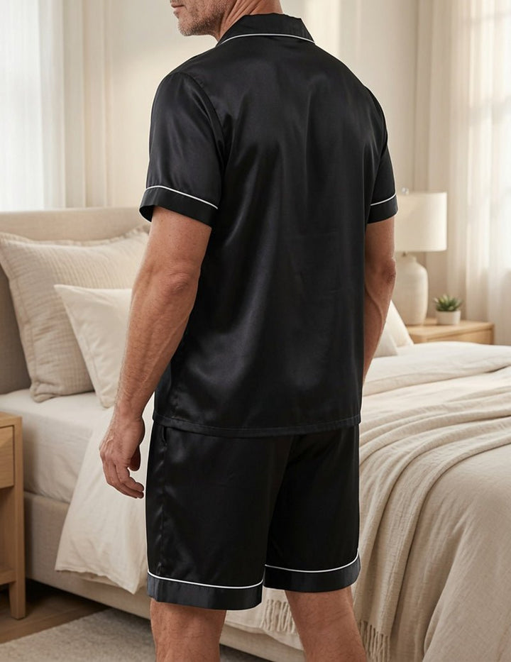 Stylish men's comfort pajama shorts set for luxurious sleep. Features short sleeve top & notch collar design.