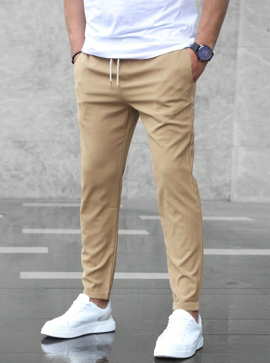 Men's business casual stretch pants, offering a luxurious feel and a versatile, tailored silhouette.