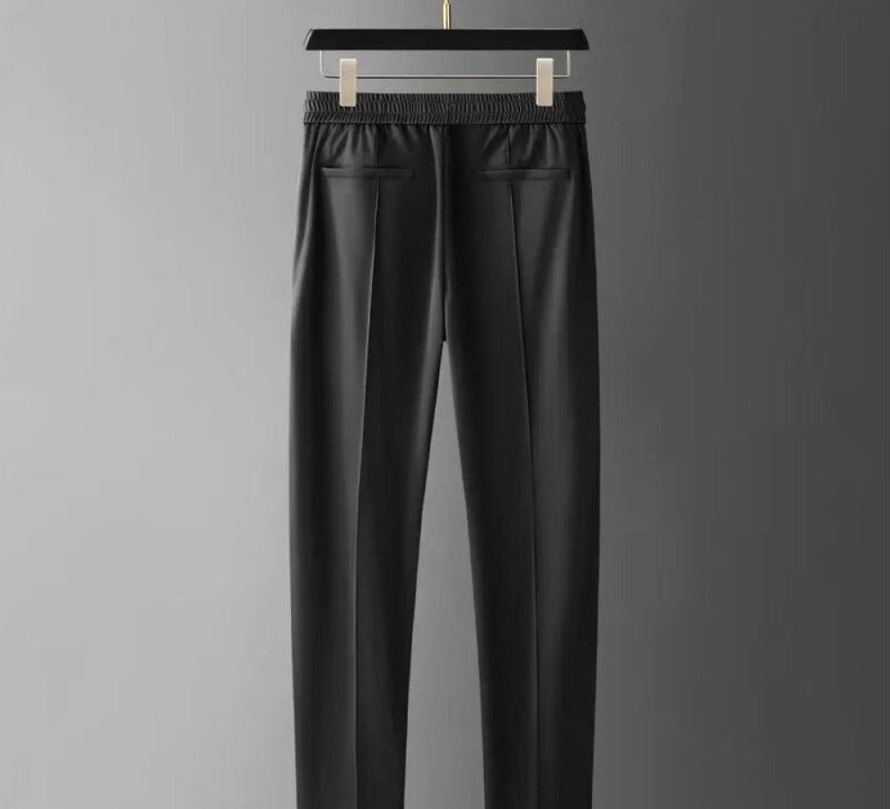 Effortless men's summer outfit: two-piece luxury polo & pants set for stylish casual wear.