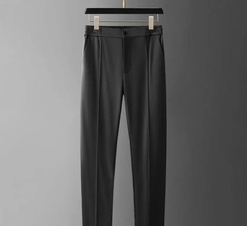 Elegant men's two-piece polo and pants set, a versatile summer fashion statement. Smart casual.