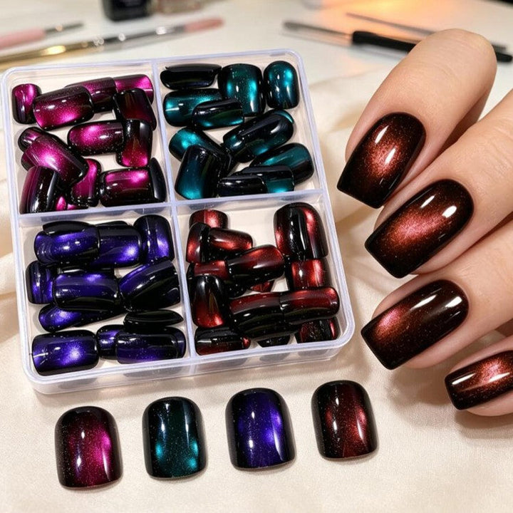 Close-up of men's press-on nails showcasing shimmering magnetic glitter effect and sleek design.