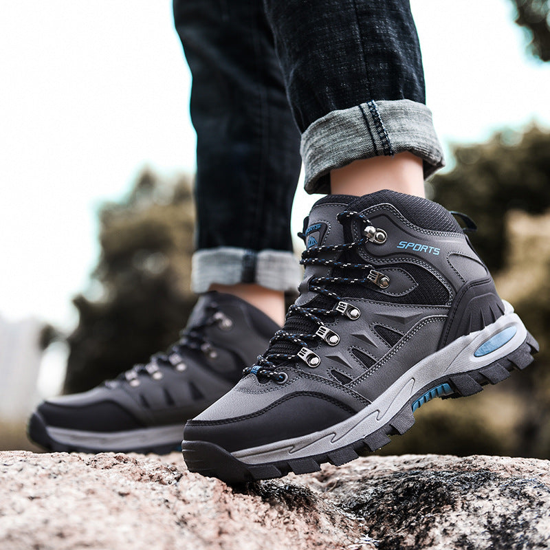 Men's durable waterproof safety boots, mid-height design for industrial and outdoor work.