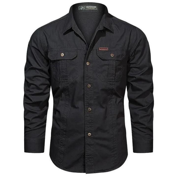 Rugged men's military style button-down shirt in durable cotton, featuring practical chest pockets.