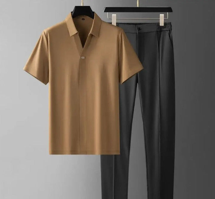 Two-piece men's outfit: stylish minimalist polo shirt and tailored trousers. Perfect for smart casual menswear.