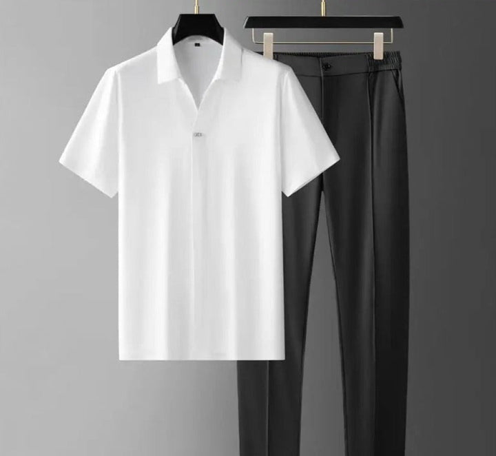 Comfortable men's co-ord set with minimalist polo and modern tailored trousers, creating a smart casual look.