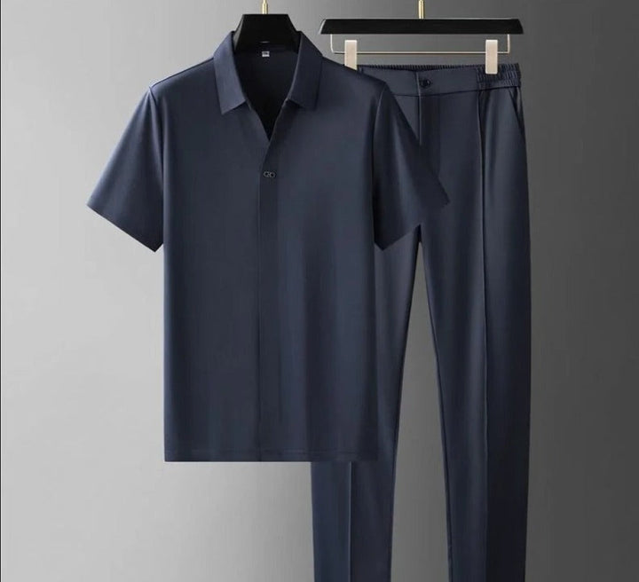 Elegant men's minimalist polo & tailored trouser set. A versatile, modern co-ord for smart casual men's outfits.