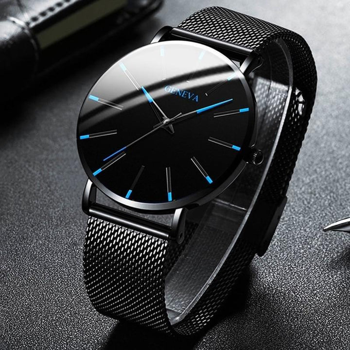 Classic men's minimalist watch on a wrist, featuring a black vegan leather band for timeless, eco-friendly style.
