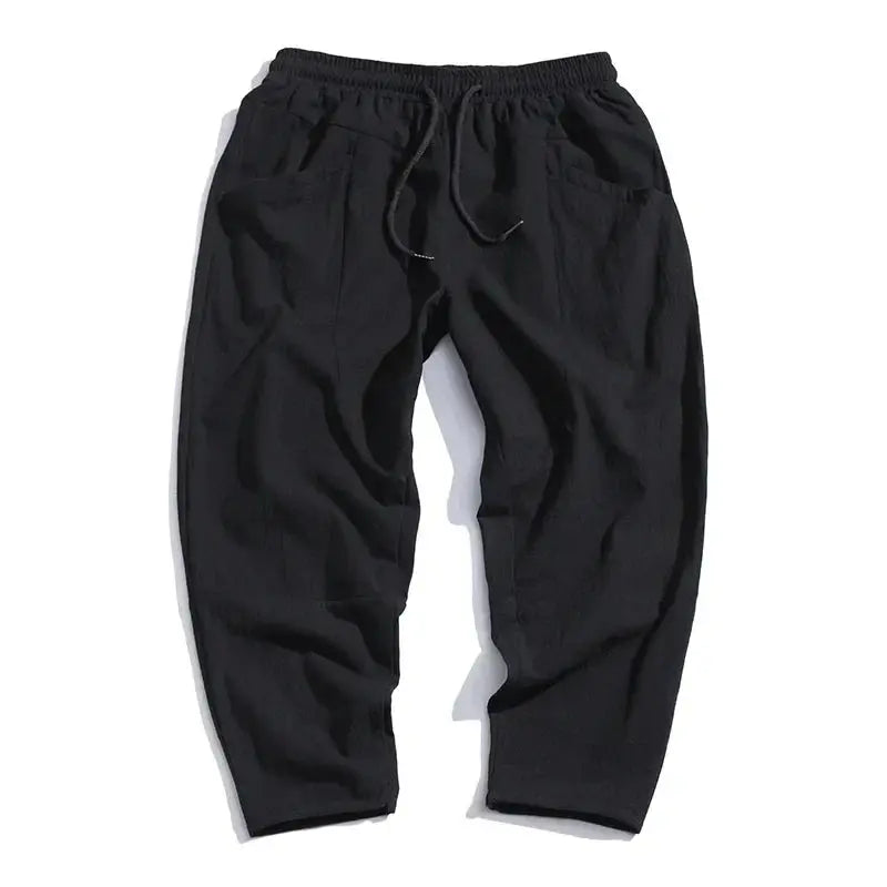 Effortlessly stylish men's modern cropped tapered pants, ideal for comfort with a relaxed fit and versatile casual appeal.