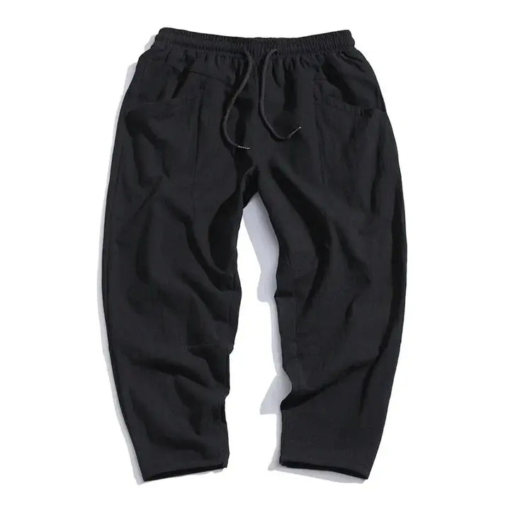 Effortlessly stylish men's modern cropped tapered pants, ideal for comfort with a relaxed fit and versatile casual appeal.