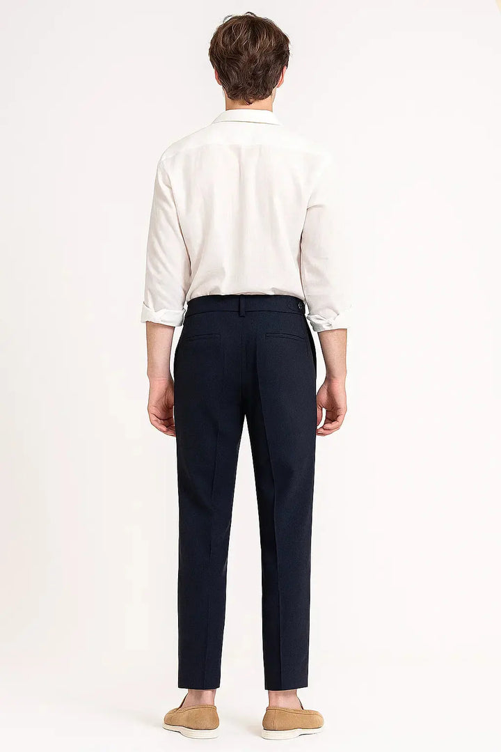 Stylish men's trousers featuring elegant pleats & modern fit, versatile for business or everyday fashion.