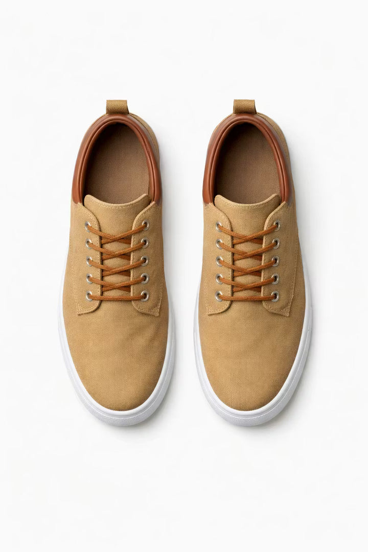 Stylish men's lace-up low-top sneakers in navy, versatile for fashion and comfort.