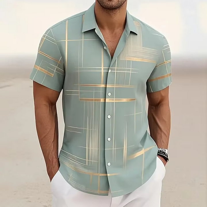 Close-up of a men's modern patterned short-sleeve button-up shirt, showcasing sleek design.