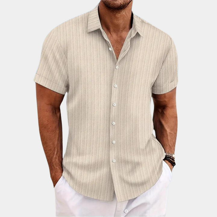 Men's classic short-sleeve button-down top. Effortless style, regular fit for casual summer wear.