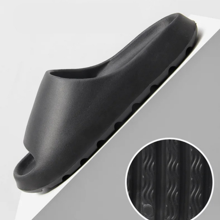Ergonomic, lightweight men's comfort slippers; easy clean slip-on style for versatile casual wear.