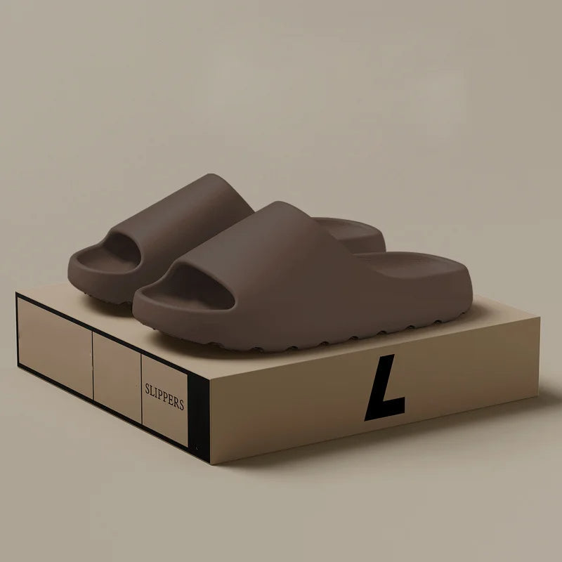 Easy slip-on men's comfort slippers; modern design for casual wear & quick changes at home.