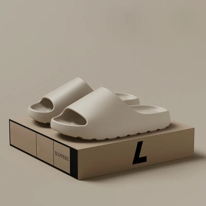 Men's lightweight, ergonomic slip-on slippers; modern style & ultimate comfort for home footwear.