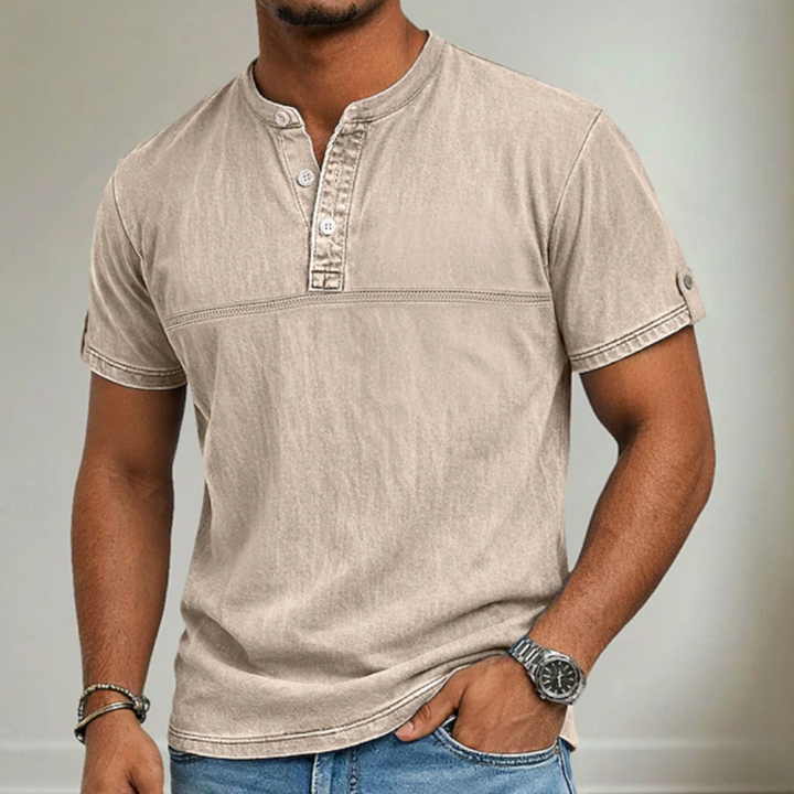 Relaxed fit men's short sleeve Henley shirt, featuring a comfortable stand collar, great for warm weather.