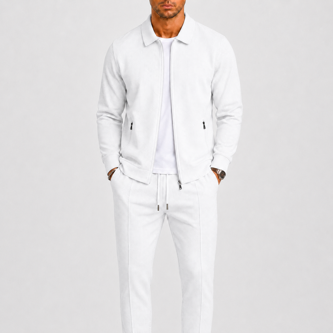 Versatile men's modern tracksuit for travel & daily wear, including a zip jacket & comfortable track pants.