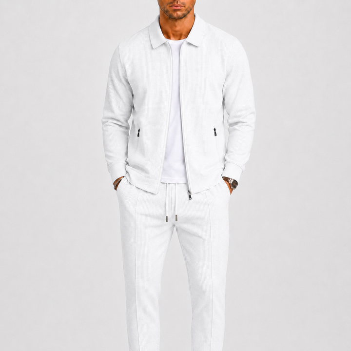 Versatile men's modern tracksuit for travel & daily wear, including a zip jacket & comfortable track pants.
