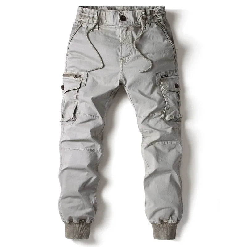 Men's streetwear utility trousers, tapered fit cargo joggers, ideal for active casual wear.
