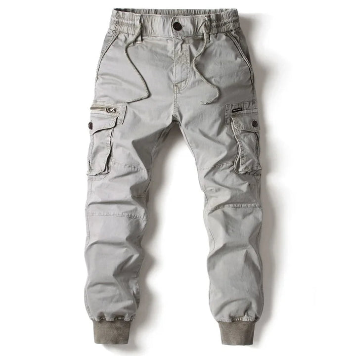 Men's streetwear utility trousers, tapered fit cargo joggers, ideal for active casual wear.
