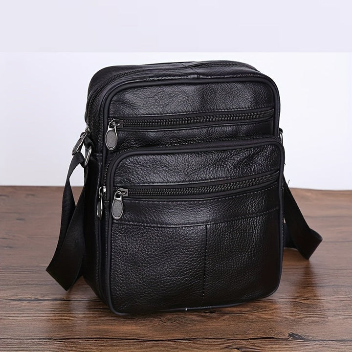 Men's multi-pocket crossbody bag with a textured finish, ideal for daily carry and travel.