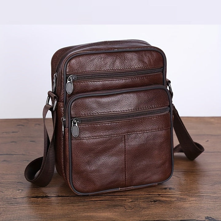 Black textured synthetic leather men's multi-pocket crossbody shoulder bag for essentials.