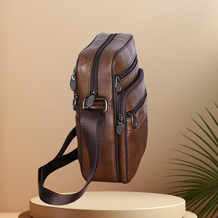 Stylish textured men's crossbody bag, multi-pocket design for organized daily essentials.