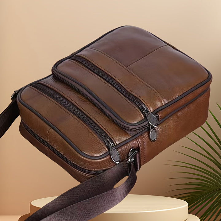 Versatile multi-pocket men's shoulder bag, textured synthetic leather, perfect for daily use.