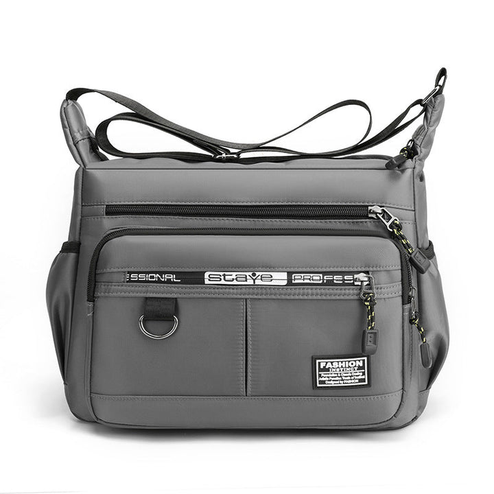 Interior view of men's multi-pocket crossbody messenger bag, showing spacious waterproof compartments.