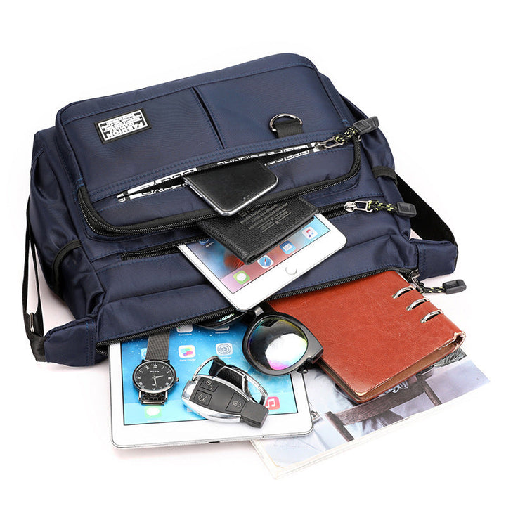 Waterproof men's multi-pocket messenger bag. Versatile shoulder/crossbody carry for travel & daily use.