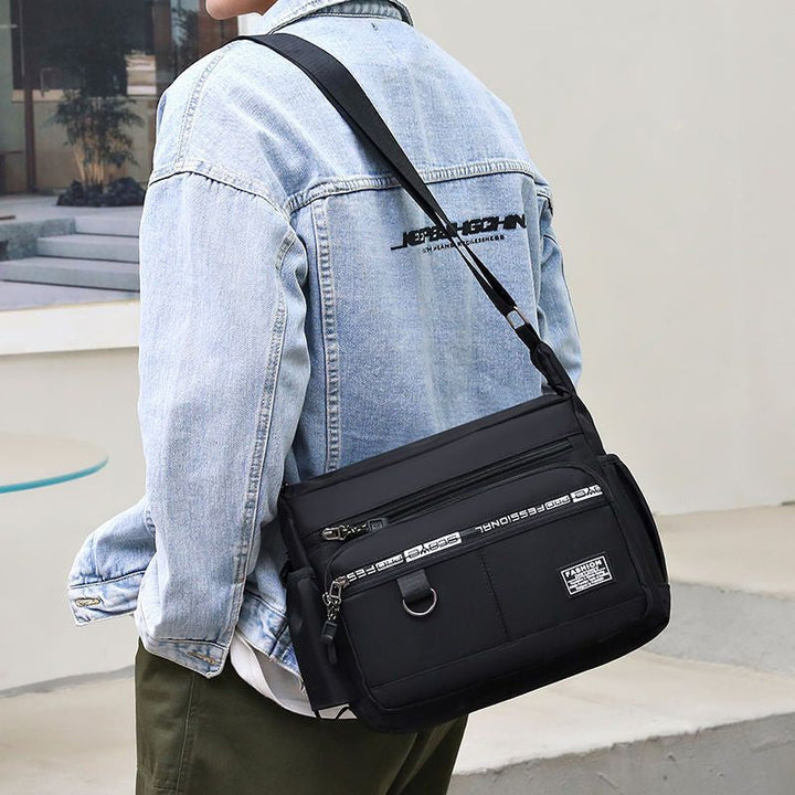 Versatile men's daily carry bag: multi-pocket crossbody messenger, waterproof & lightweight for essentials.