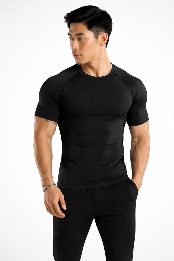 Slim fit men's crew neck tee, highlighting muscle definition. Versatile short sleeve top.