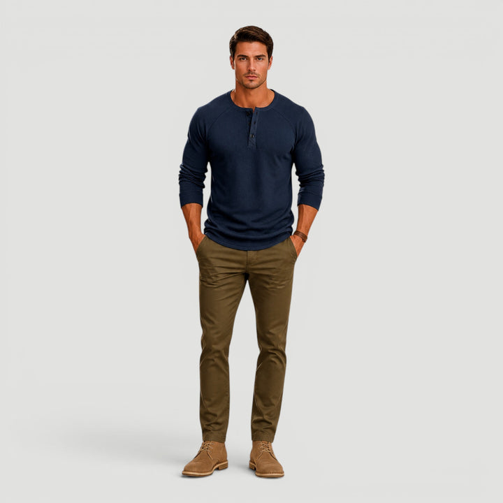 Comfortable men's Henley sweater in soft knit with button neck. Perfect long sleeve for casual layering & everyday wear.
