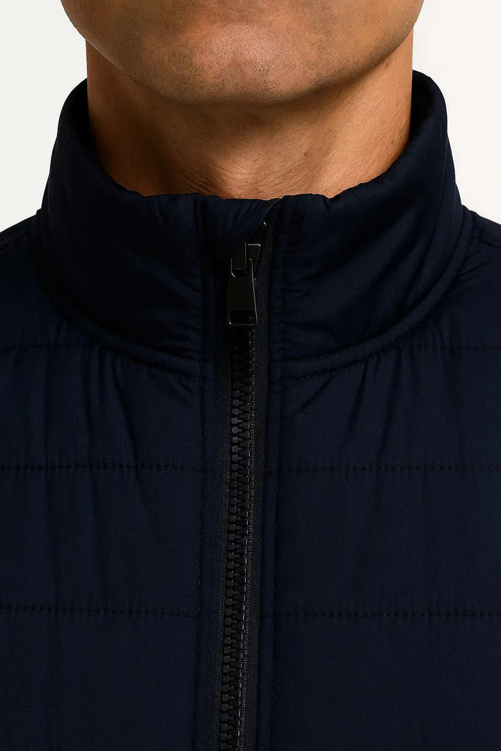 Comfortable men's warm vest, a sleeveless puffer jacket perfect for active cold weather outdoor wear.