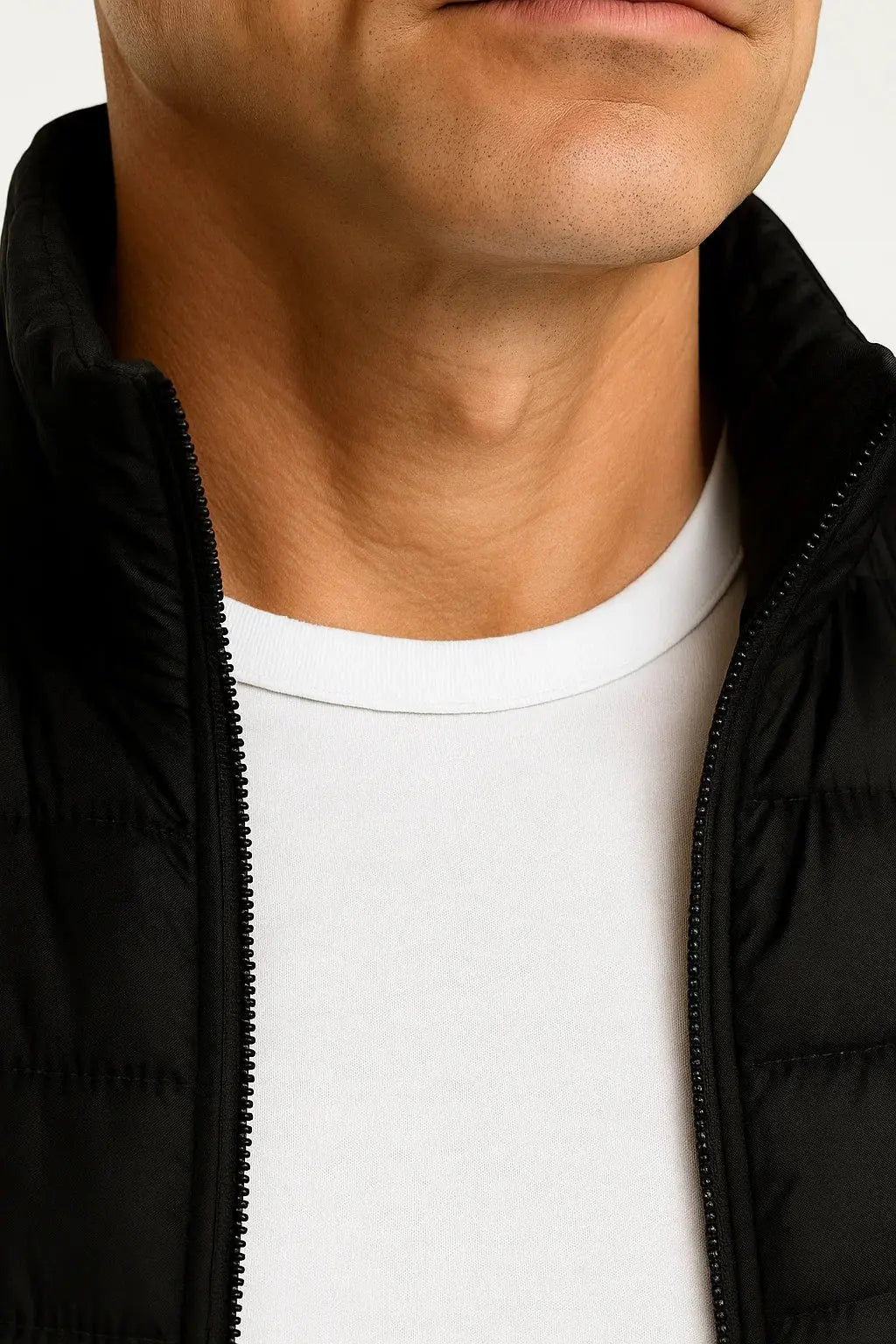 Men's puffer vest, a warm sleeveless winter jacket for cold weather, perfect for layering and outdoor activities.