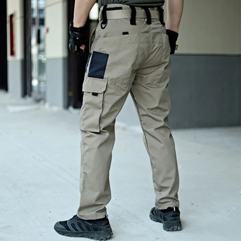 Stylish men's Nikolai cargo pants, comfortable & versatile for casual wear or tactical outdoor activities. Multi-pocket design.