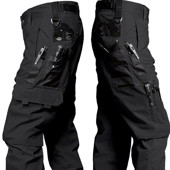 Durable Nikolai men's tactical cargo pants, ideal for outdoor wear & adventure. Features tough fabric & practical utility pockets.