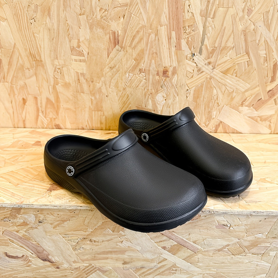 Close-up of non-slip sole on men's durable garden clogs, ideal for work.