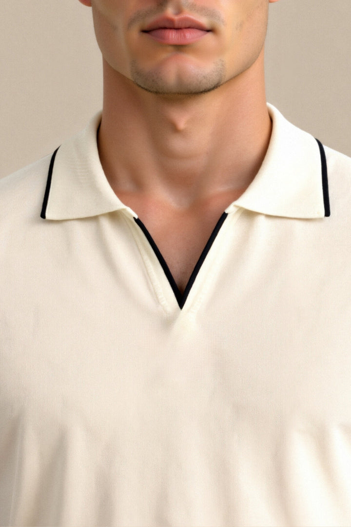 Elegant men's sleeveless polo with distinctive contrast detailing, Old Money aesthetic.