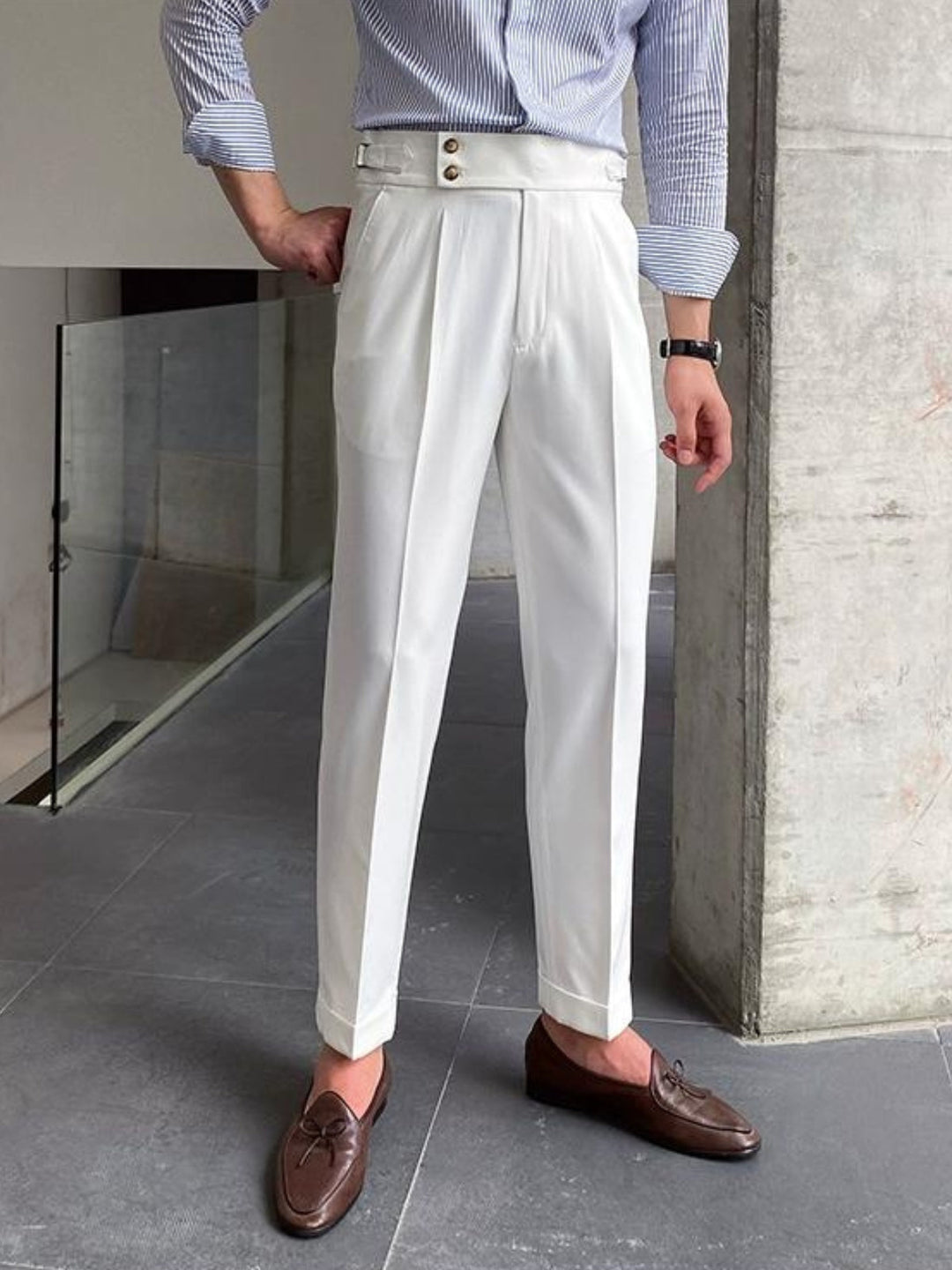 Navy men's Gurkha trousers, pleated and tailored, perfect for a sophisticated old money aesthetic.