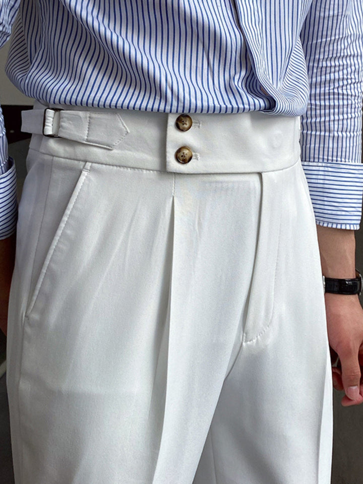 Side view of men's Gurkha pants, showcasing adjustable waist tabs and clean pleats, timeless tailoring.