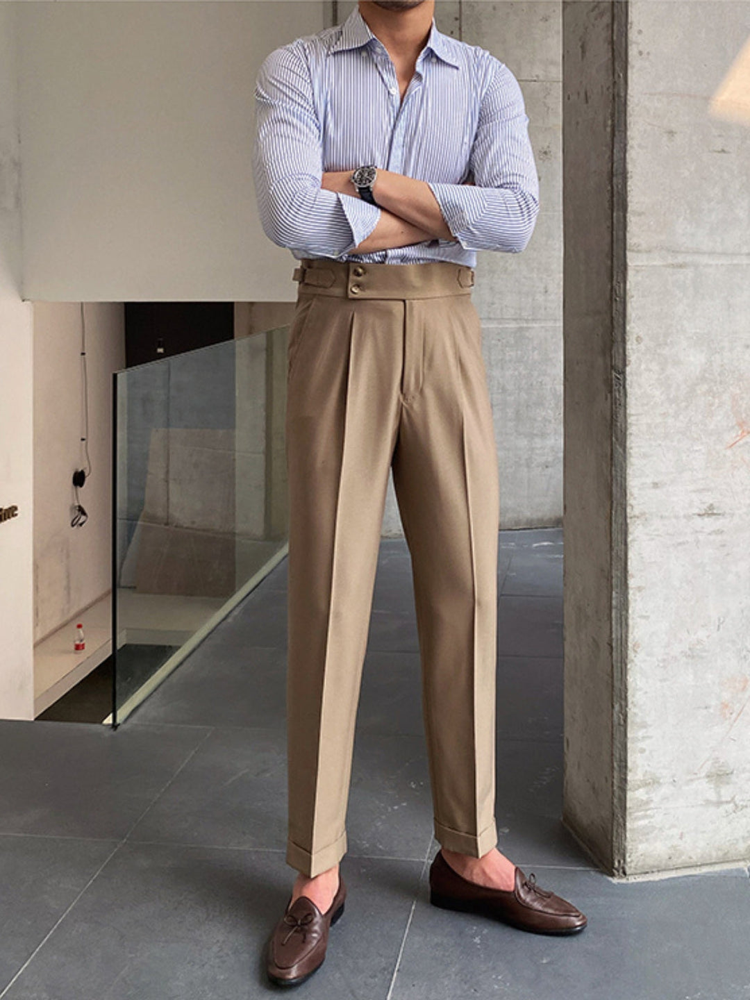 Sophisticated men's Gurkha trousers, high-waisted and pleated, for a refined formal casual look.