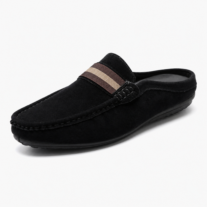 Close-up of a men's stylish open heel loafer, showcasing slip-on comfort and casual design.